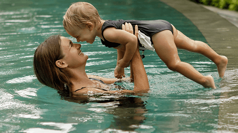 mother daughter in pool